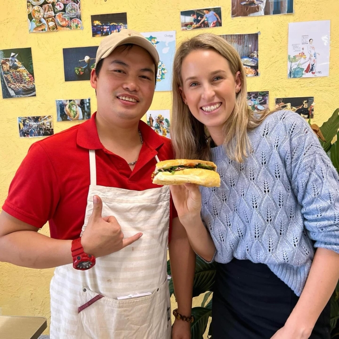 Loc Nguyen (Bill), owner of Mr Bill’s Vietnamese Canteen, poses for a photo with a customer. Photo courtesy of Instagram/crlisaatwood