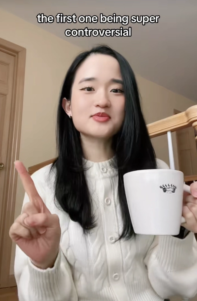 Chinese-American TikTok creator Sherry holds a cup of hot water as she promotes traditional Chinese health practices. Photo from Sherrys TikTok