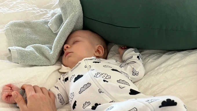 Before creating the Sleepy Hat, Holden would use a cloth to limit visual distractions during nap time for her son, Maxime. Photo courtesy of Julia Holden
