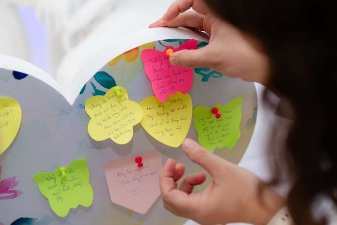 Visitors left sharing messages at the exhibition. Photo courtesy of J&J