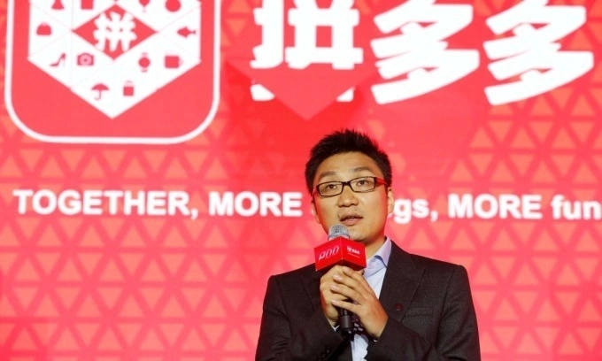 Colin Huang, founder and CEO of online group discounter Pinduoduo, speaks during the companys stock trading debut at the Nasdaq Stock Market in New York, during an event in Shanghai, China July 26, 2018. Photo by Yin Liqin/CNS via Reuters