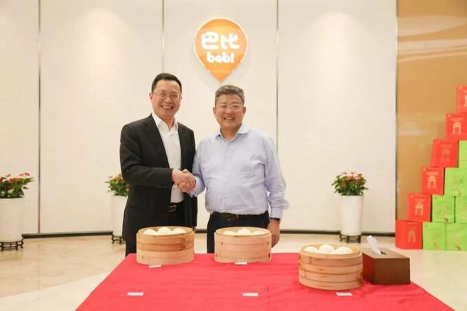 Liu Huiping (L), China’s King of Steamed Buns in April, 2024. Photo from Babi Food Companys website