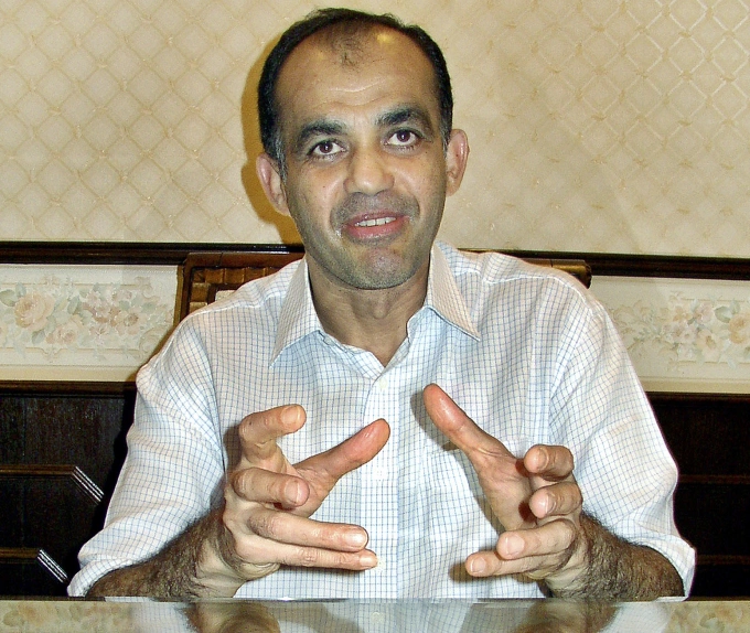 Malaysian tycoon Syed Mokhtar Albukhary talks to Reuters during an interview in Kuala Lumpur on Dec. 9, 2003. Photo by Reuters