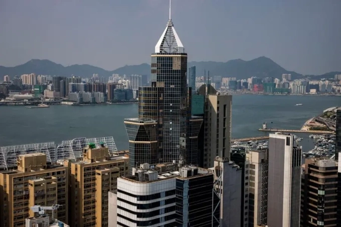 Commercial and residential buildings are seen in Hong Kong. Photo by AFP