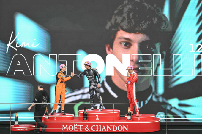 Kimi Antonelli (C), Oscar Piastri (L) and Charles Leclerc (R)on the podium after the Formula One Japanese Grand Prix. Photo by AFP