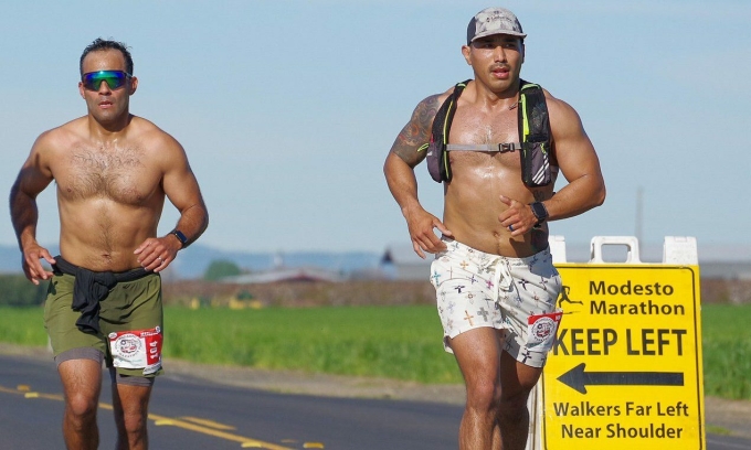 American runner loses marathon title due to mistake by course vehicle