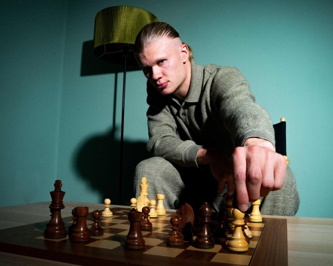 Erling Haaland poses playing chess after investing in announced an investment in the Total Chess World Championship Tour. Photo from Total Chesss Facebook page.