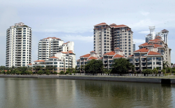 View of private residential buildings along the Kallang River in Singapore, Aug. 23, 2003. Photo by AFP
