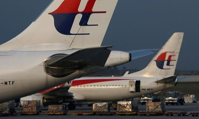 2014 年 7 月 21 日,马来西亚航空公司的飞机停在吉隆坡国际机场的停机坪上。路透社摄