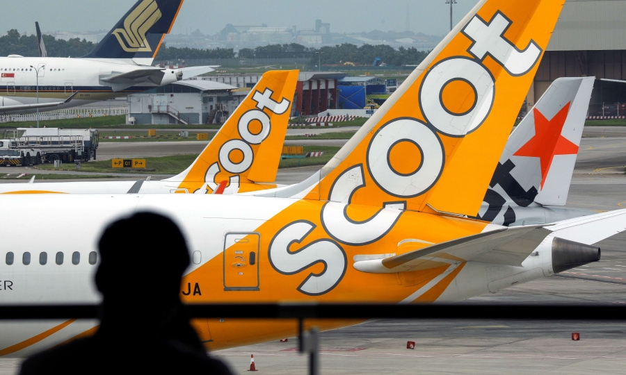 Politics Man charged for sexual assault of co-passenger on Scoot flight from Singapore to Australia