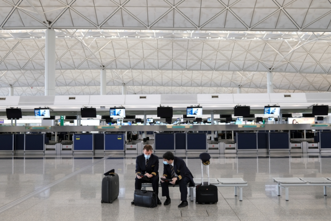 Pilots at Hong Kong International Airport. Photo by Reuters