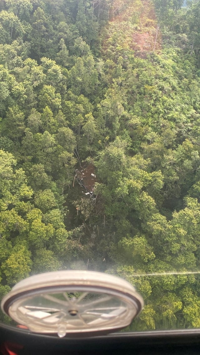 Debris at the site of a helicopter crash in Sekadau regency, West Kalimantan province, Indonesia, April 16, 2026. Picture taken through a window. Indonesias National Search and Rescue Agency (BASARNAS)/Handout via Reuters
