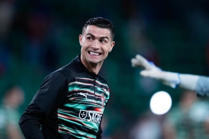 Cristiano Ronaldo smiles during the warm-up before Portugals match against Hungary in the 2026 World Cup qualifiers, at the Lisbon stadium in Portugal, on Oct. 14, 2025. Photo by AP