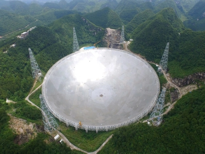 The Five-hundred-meter Aperture Spherical Telescope, the worlds largest single-dish radio telescope. Photo from National Astronomical Observatories, Chinese Academy of Sciences