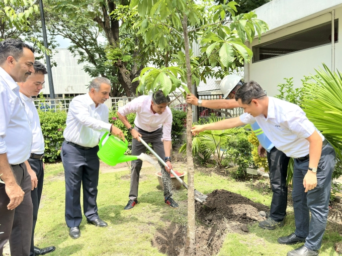 Wipros leadership participates in a tree-planting activity at VSIP Factory in Vietnam. Photo courtesy of Wipro