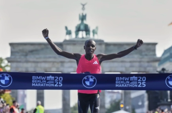 Sebastian Sawe finishes first at the Berlin Marathon on Sept. 21, 2025. Photo by AP