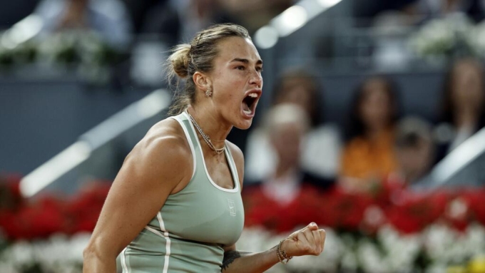 World number one female tennis player Aryna Sabalenka reacts during a match. Photo by AFP