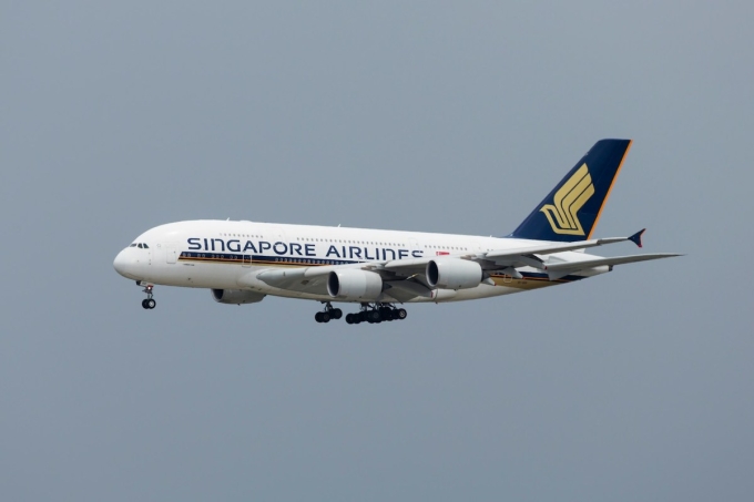 A Singapore Airlines aircraft seen at Sydney Airport, Australia. Photo by Unsplash/Troy Mortier