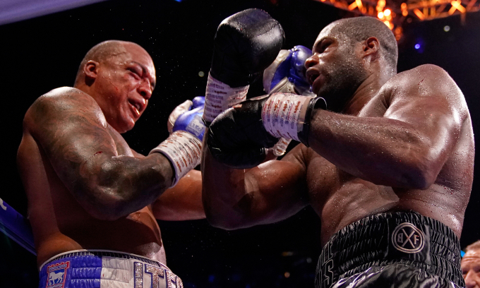 Dubois climbs off the canvas to become two-time world heavyweight champion