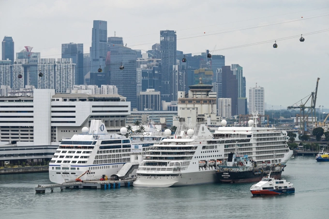 Cruise ships are docked at the Habourfront cruise centre in Singapore on February 24, 2026. Photo by AFP