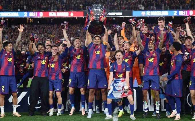 Barcelona players celebrate the 2025-2026 La Liga title following their match against Real Madrid at Camp Nou on May 10, 2026. Photo by AFP