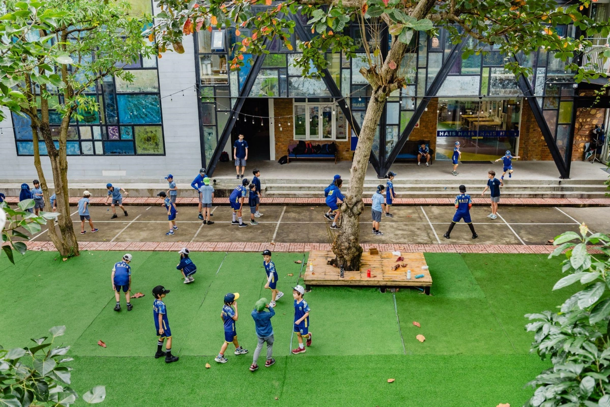 Students playing in campus. Photo courtesy of HAIS