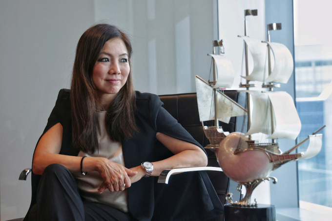 How did Singapore biggest lender DBS’s stock perform before CEO Tan Su Shan sold 100,000 shares? 2 Tan Su Shan in August 2024. Photo by SPH Media via AFP