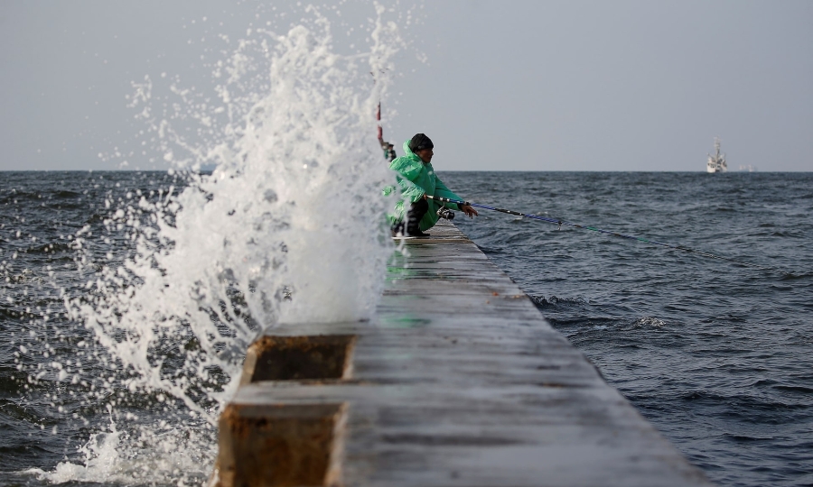 Southeast Asia's No.1 economy promotes 600-km seawall project to tackle climate change