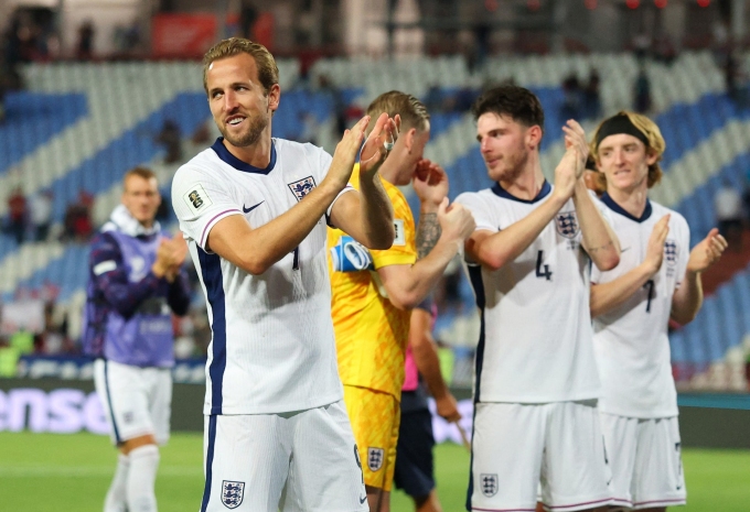 England players celebrate after thrashing Serbia 5-0 in the 2026 World Cup qualifying match on Sept. 9, 2025. Photo by Reuters