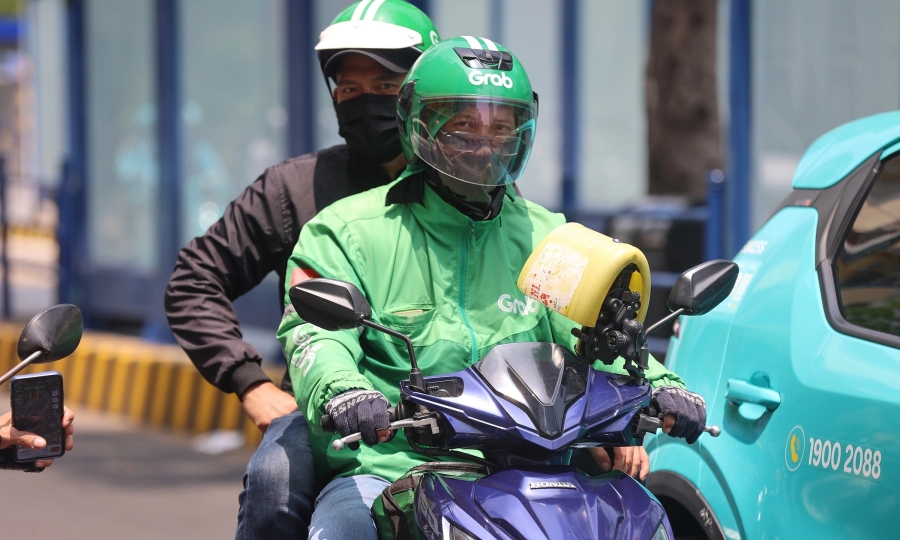 Over a decade later, Vietnam's 600,000 gig drivers remain uninsured workers