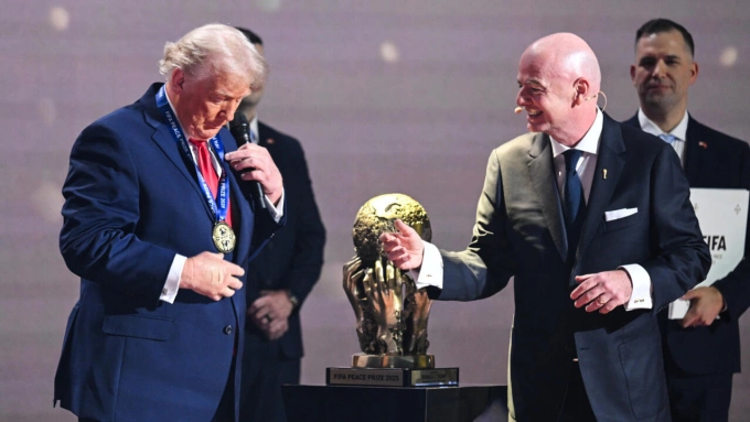 U.S. President Donald Trump (L) and FIFA President Gianni Infantino. Photo by AFP