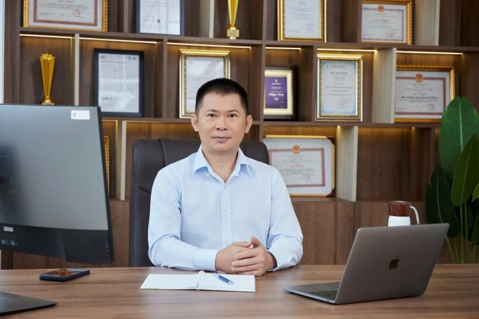Thanh Pham (C), CEO of Vietnam-based software development firm Saigon Technology. Photo courtesy of Saigon Technology