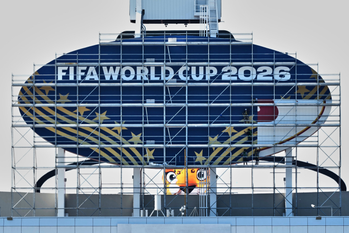 Workers cover the Kansas City Chiefs logo during the renovation of Arrowhead Stadium into Kansas City Stadium for the 2026 World Cup, June 8, 2026, in Kansas City, Missouri. Photo by AP