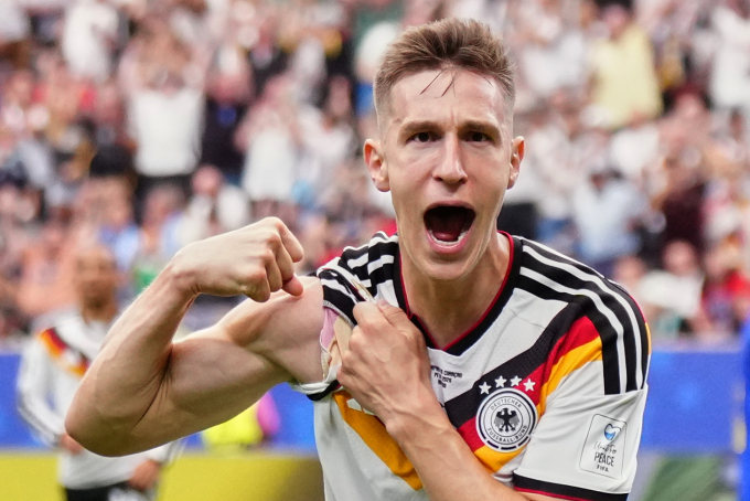 Germanys Nico Schlotterbeck celebrates after scoring his sides second goal during the World Cup Group E football match between Germany and Curacao in Houston, June 15, 2026. Photo by AP