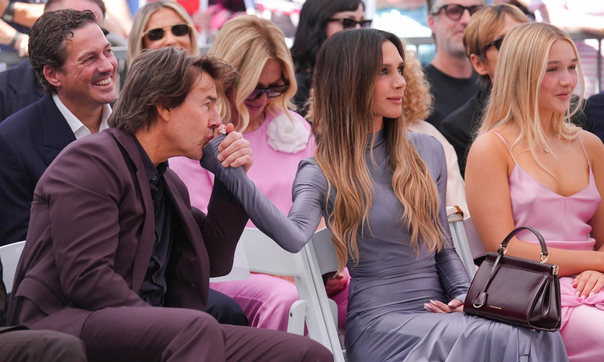 Victoria Beckham sparks mixed reactions after Tom Cruise kisses her hand at husband's Hollywood event