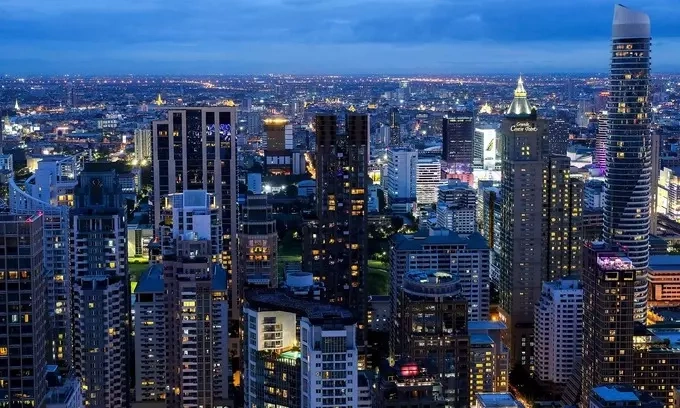 Thailand eyes high-income status within 12 years 1 Bangkoks skyline is photographed during sunset, July 3, 2023. Photo by Reuters