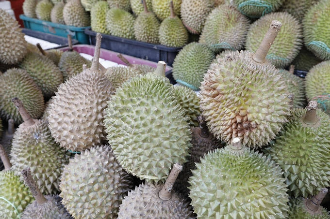 Durians are seen for sale in Singapores Little India district on July 25, 2016. Photo by AFP