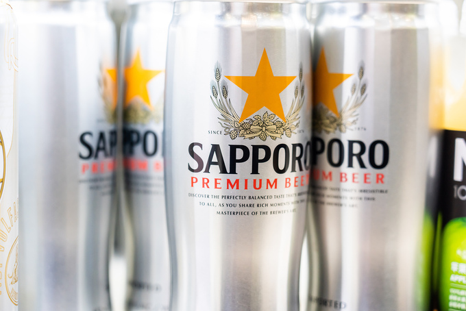 Cans of Sapporo Beer seen in a supermarket. Photo by ZUMA Press Wire via Reuters