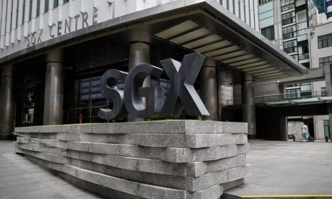 A man walks past the Singapore Exchange (SGX) in central business district area in Singapore, April 7, 2020. Photo by Reuters