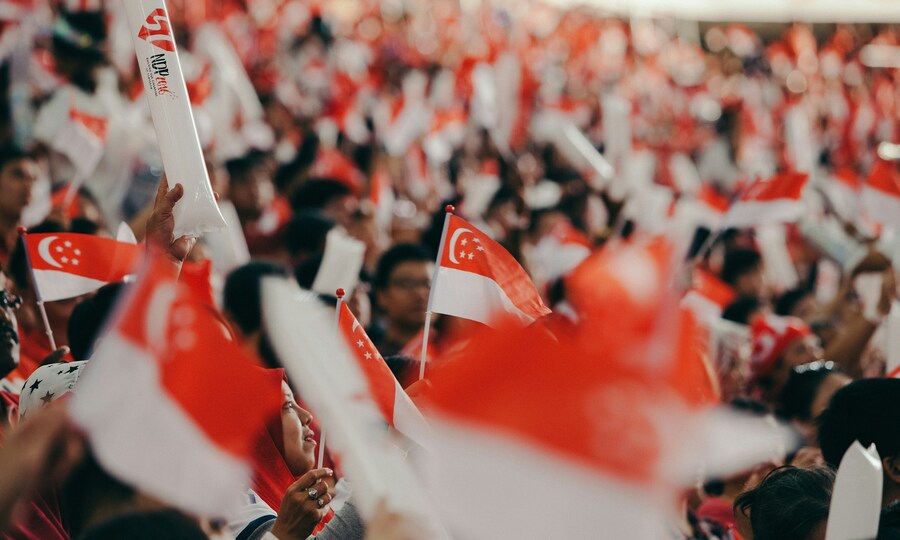 Singapore's AI-generated National Day banner erases flag's crescent and stars, invents fake stadium