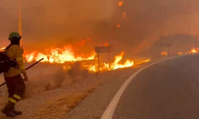 Firefighters battle a wildfire in Los Gallardos, Almeria, Spain on July 9, 2026. Photo by AFP