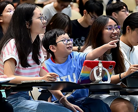 Theodore Kwan, 8, attends a chemistry lecture at Nanyang Technological University. Photo courtesy of NTU