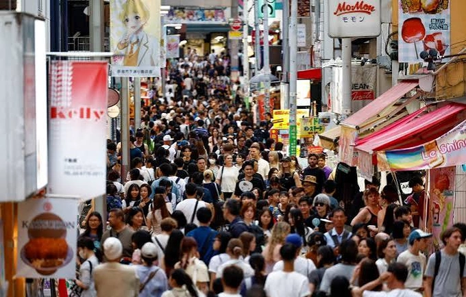 Tourists in Tokyo, Japan. Photo by Reuters