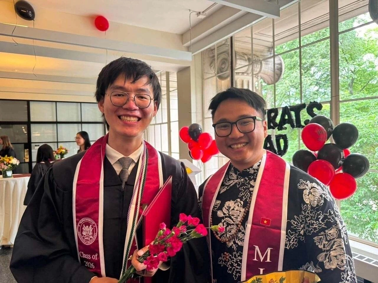 Quang Vinh (right) and a friend on their graduation day at MIT, May 2026. Photo courtesy of Vinhs family