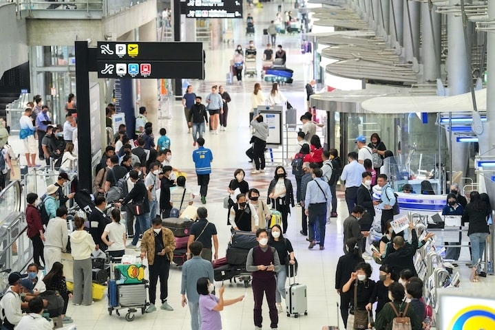 Tourists arrive, ahead of brace of an influx of Chinese tourists as COVID restriction are dismantled, at Bangkoks Suvarnabhumi airport, Thailand, January 4, 2023. Photo by Reuters