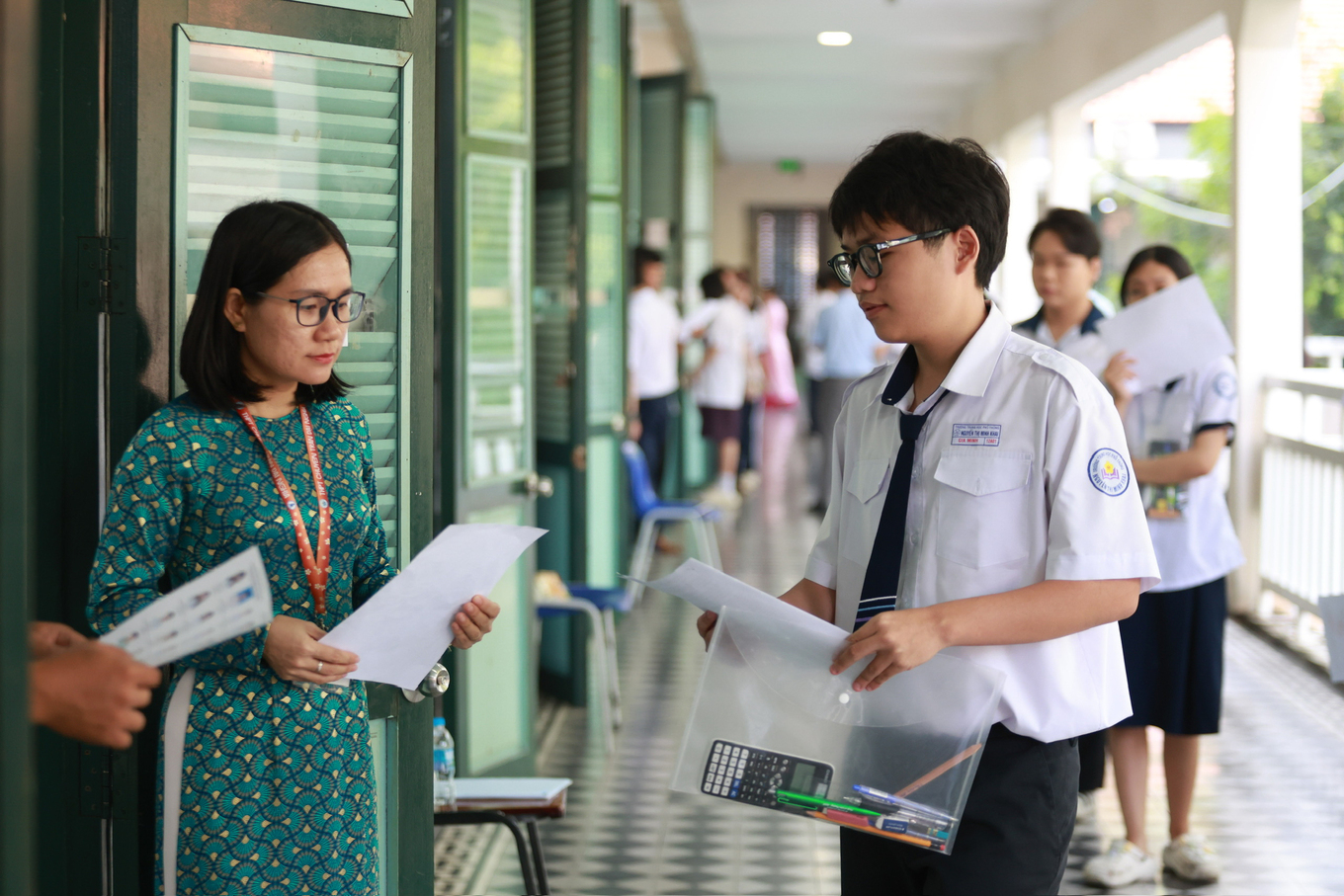 Students are called to enter the exam room during their high-school graduation examination in HCMC, June 2026. Photo by VnExpress/Quynh Tran