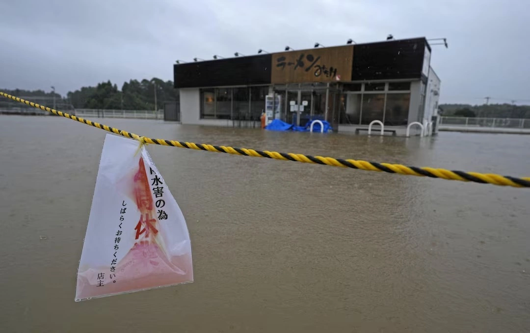 The area around a ramen restaurant is flooded by heavy rain as Typhoon Dujuan approaches, in Oamishirasato, Chiba Prefecture, Japan, September 21, 2026 in this photo taken by Kyodo.