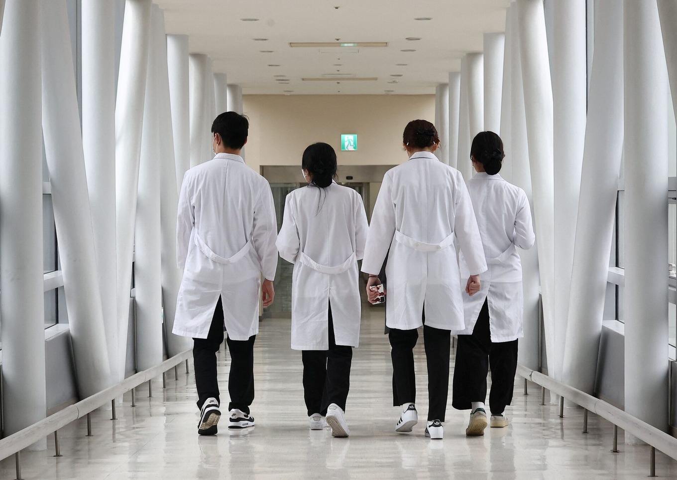 Medical workers walk at a hospital in Seoul, South Korea, February 19, 2024. Photo by Yonhap via Reuters