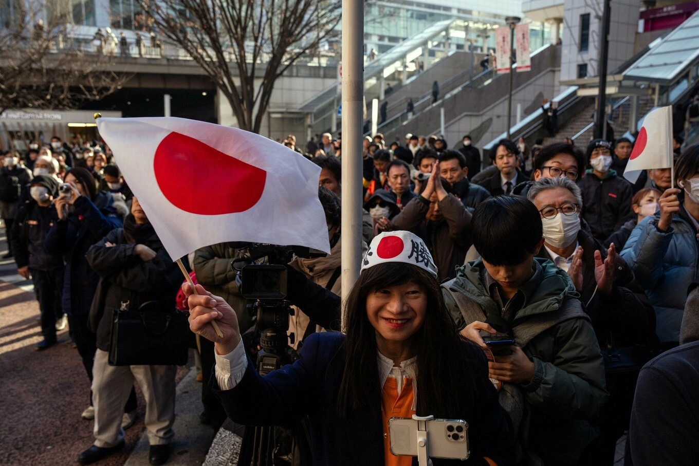 People attend a campaign event for Japan’s far-right Sanseito party in Tokyo, in January. Photo by AP