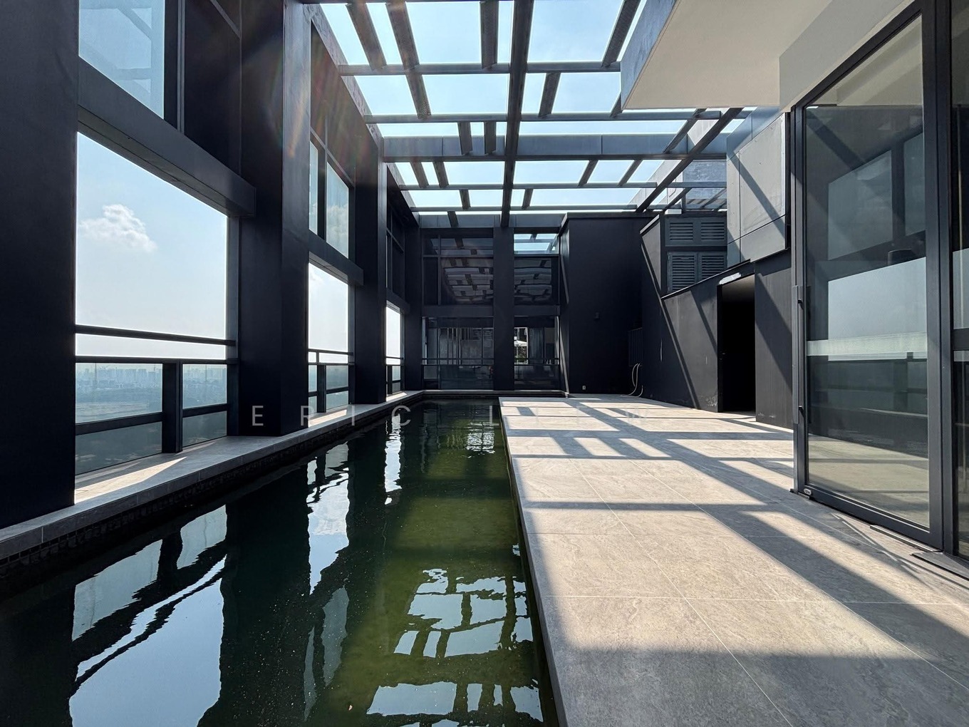A pool terrace shown in the listing for the 36th-floor penthouse at Nouvel 18 in Singapore, one of six seized apartments going to auction on Oct. 28, 2026. Photo courtesy of SRI